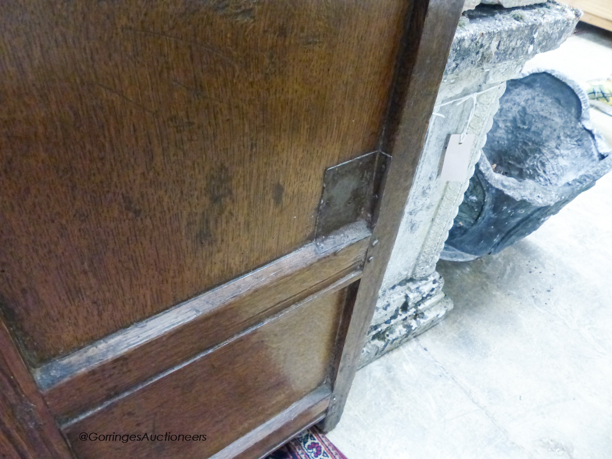 A 17th century oak low cupboard of rectangular form